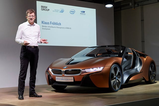 alt="Klaus Fröhlich of BMW Group speaks at a news conference in Munich, Germany, on Friday, July 1, 2016. BMW Group, Intel and Mobileye are announcing a partnership among the three companies to work together with the goal of bringing highly and fully automated"